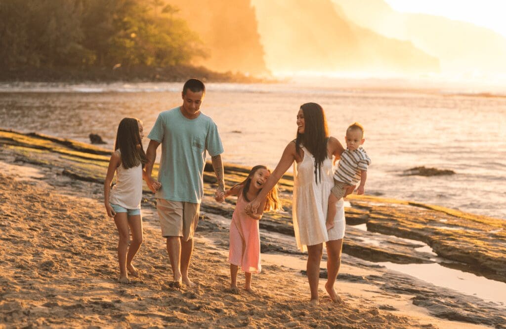 Family walking together at the beach. What does a Naturopath do? Naturopath Brisbane Northside. Holistic Counselling Wavell Heights. Brisbane Livewell Clinic