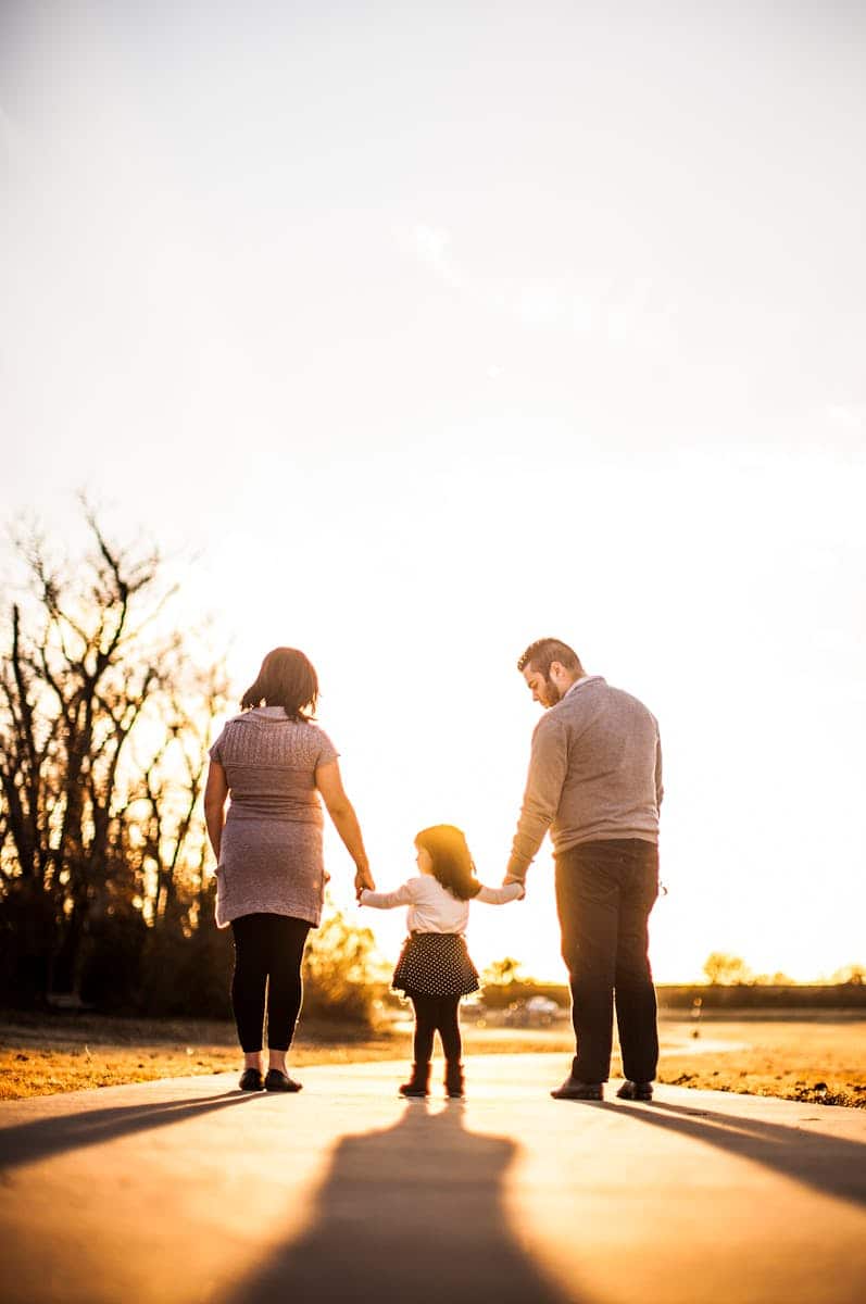 No longer drinking alcohol Photo of Family Standing Outdoors During Golden Hour. No longer drinking alcohol
