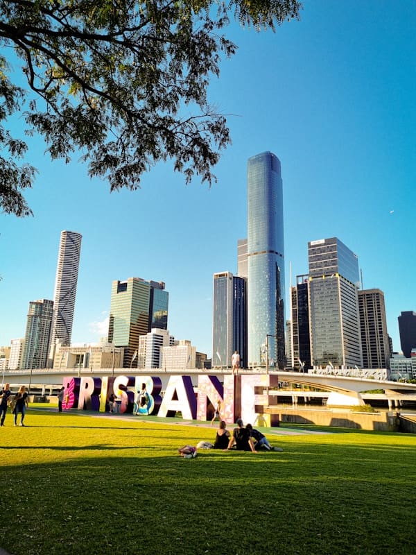 Brisbane sign in front of Brisbane city