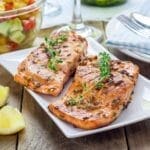 A plate of grilled salmon. 