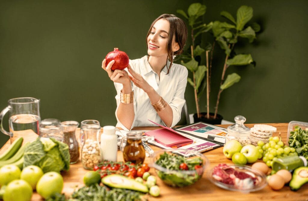 Nutritionist holding an apple