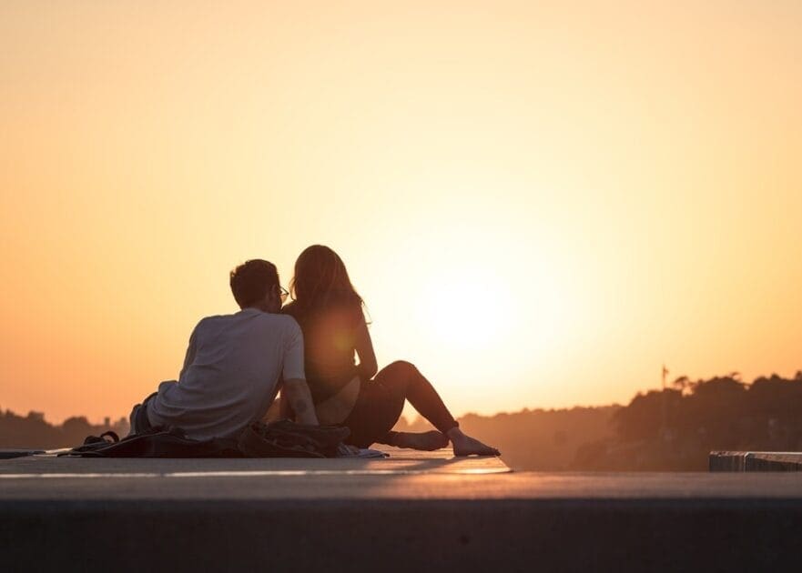Couple sitting near trees during golden hour. Youth Counselling Brisbane. Counselling Clayfield. Brisbane Livewell Clinic