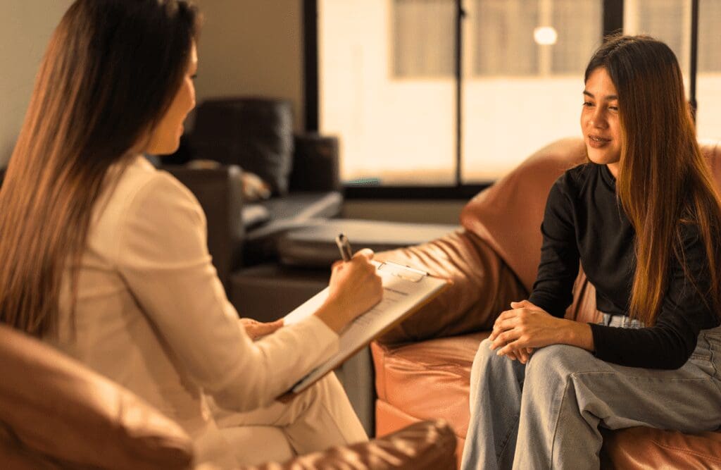 Client and Hypnotherapist during Hypnotherapy Initial Consultation. Hypnotherapy FAQs. Hypnotherapy for Alcohol Addiction. Brisbane Livewell Clinic