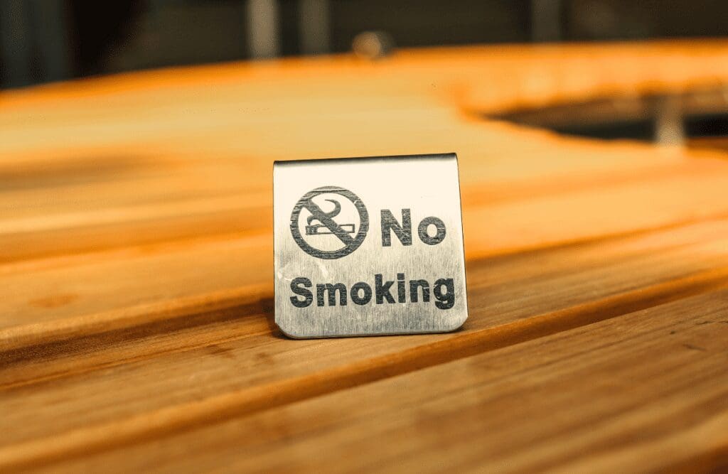 A no smoking sign. How much is Hypnotherapy. Brisbane Llivewell Clinic
