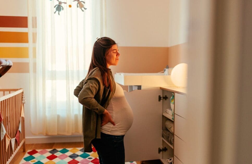 Pregnant woman with back pain. Is Acupuncture good during Pregnancy. MTHFR Gene Test. Pregnancy Osteopath. Brisbane Livewell Clinic