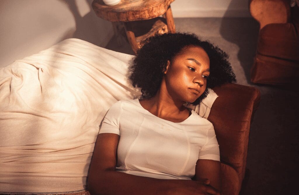 Woman resting on the couch. Gut Health Brisbane. Brisbane Livewell Clinic