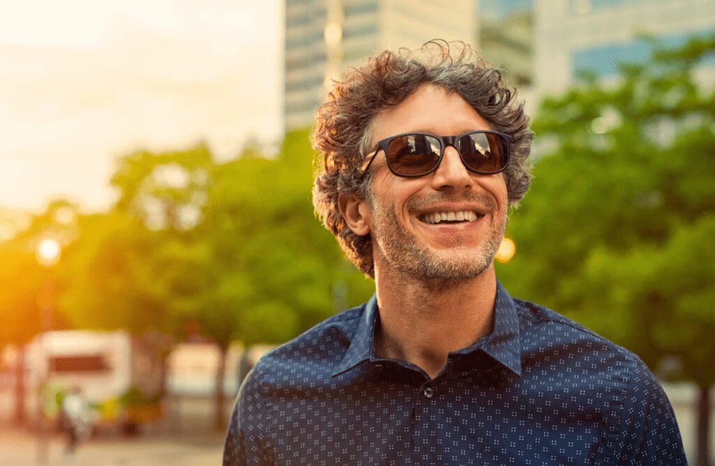 Man smiling after his hypnotherapy for weight loss. Weight loss hypnosis. Holistic Counselling for Identity Loss. Hypnotist Near Me. Brisbane Livewell Clinic