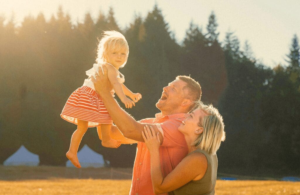 Father carrying their daughter. Hypnotherapy cost in Australia. Hypnosis to Stop Smoking. Brisbane Livewell Clinic