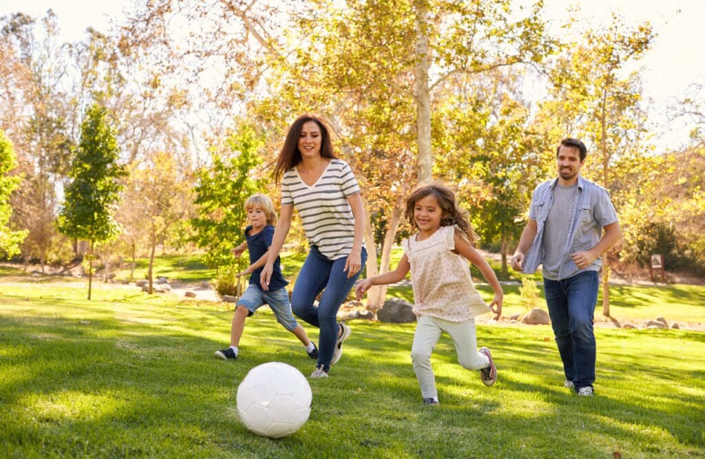 Family playing soccer outdoor. Hypnotherapy for Alcoholism. DNA Testing Brisbane. DNA Test in Brisbane. Brisbane Livewell Clinic