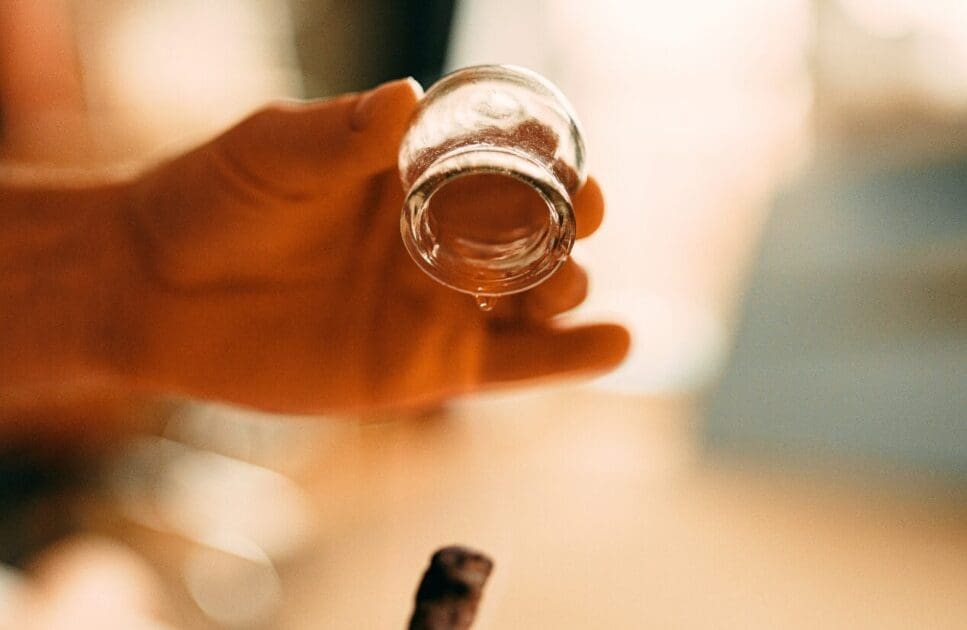 Person holding a cupping cups. Cupping Near Me. Brisbane Livewell Clinic