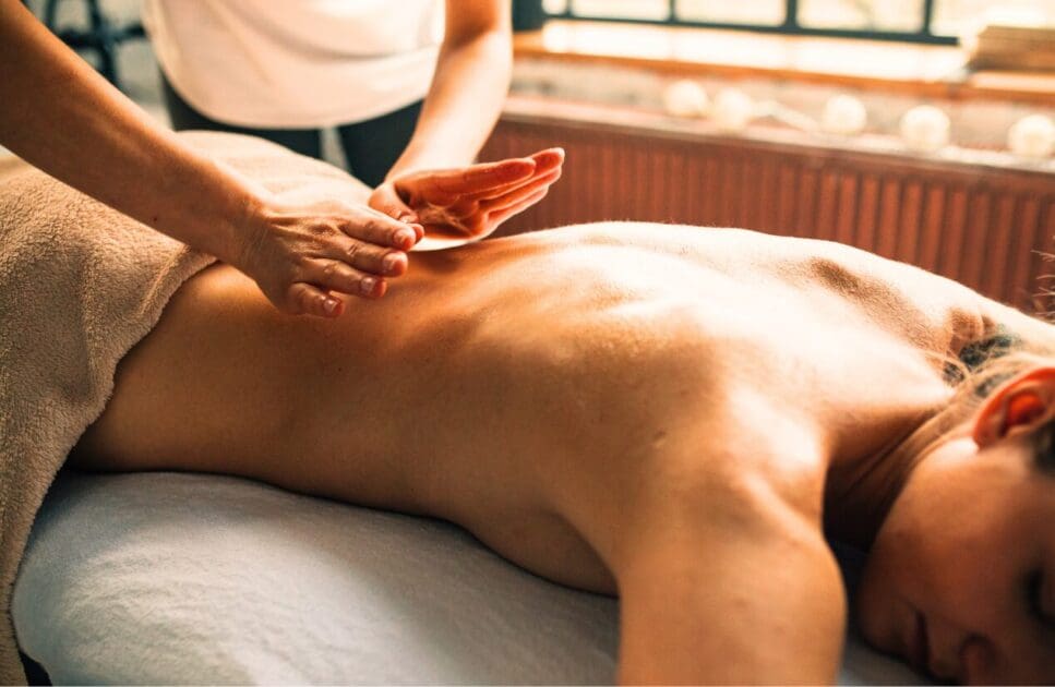 Woman enjoying a relaxing massage. Relaxation Massage Near Me. Postnatal Massage Brisbane. Brisbane Livewell Clinic