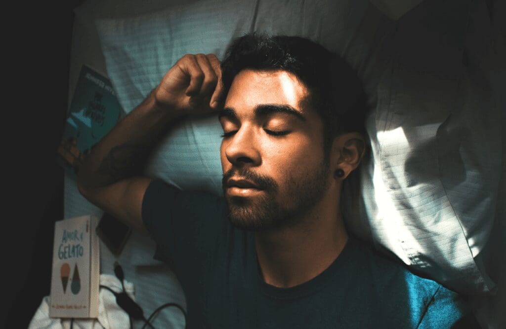 Man sleeping on the bed. Hypnosis in Sydney. Brisbane Livewell Clinic