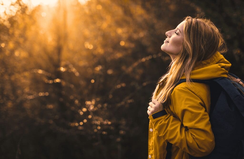 Woman enjoying peace in nature. Naturopaths. Brisbane Livewell Clinic