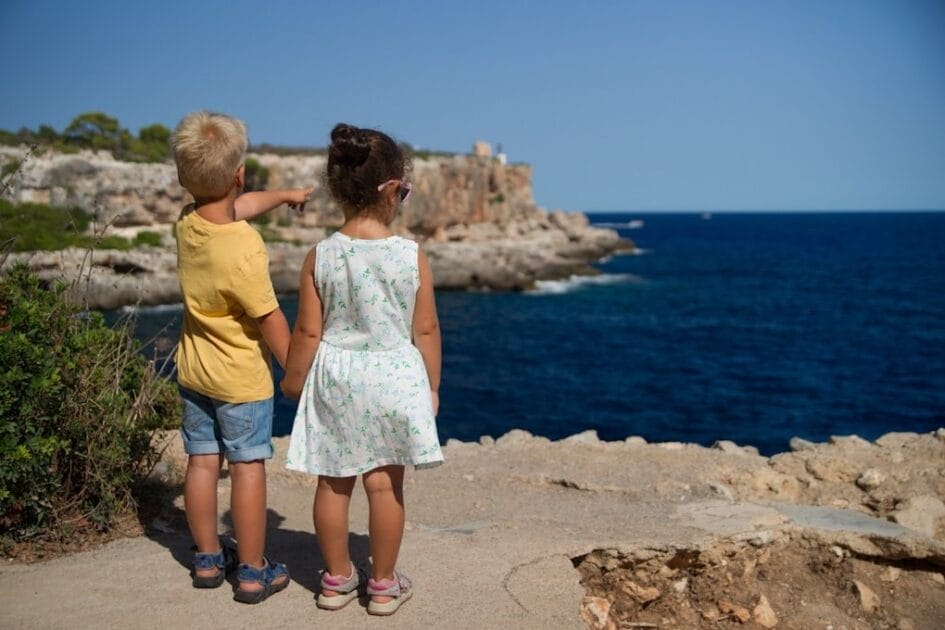 Two children standing near cliff watching the ocean. Genetic Methylation Test Brisbane