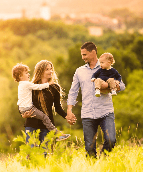 Family walking outdoors, healthier after visiting the No. 1 Naturopath and Wellness Clinic in Brisbane - Brisbane Livewell Clinic