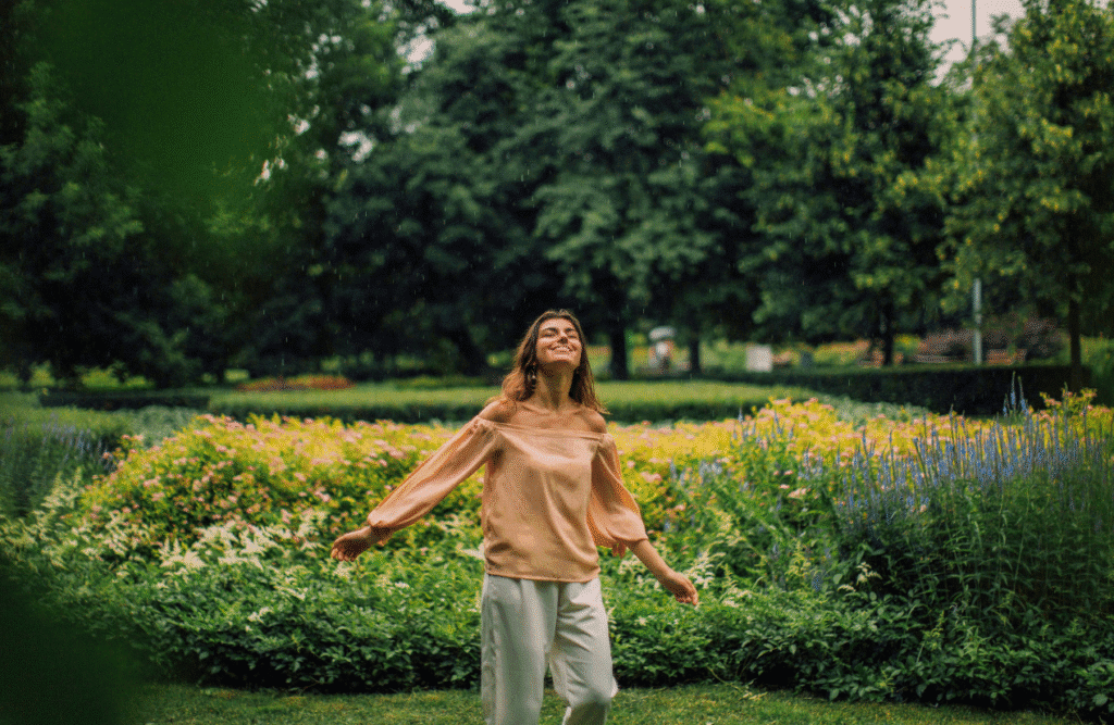 Carefree woman standing in the park. Gut Microbiome Testing Australia. Impact of Hypnosis on Sleep. How Osteopathy may Support Posture and Structural Alignment. Brisbane Livewell Clinic
