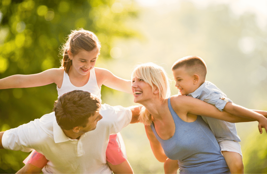 Parents playing with their children outdoors. Natural Therapies Brisbane. Childrens Naturopath. Naturopaths. Naturopathic Practitioner. North Brisbane Naturopath and Wellness Centre. Hypnosis for weight loss. Holistic Counselling Nundah. Brisbane Livewell Clinic. Hypnosis Locations we Service