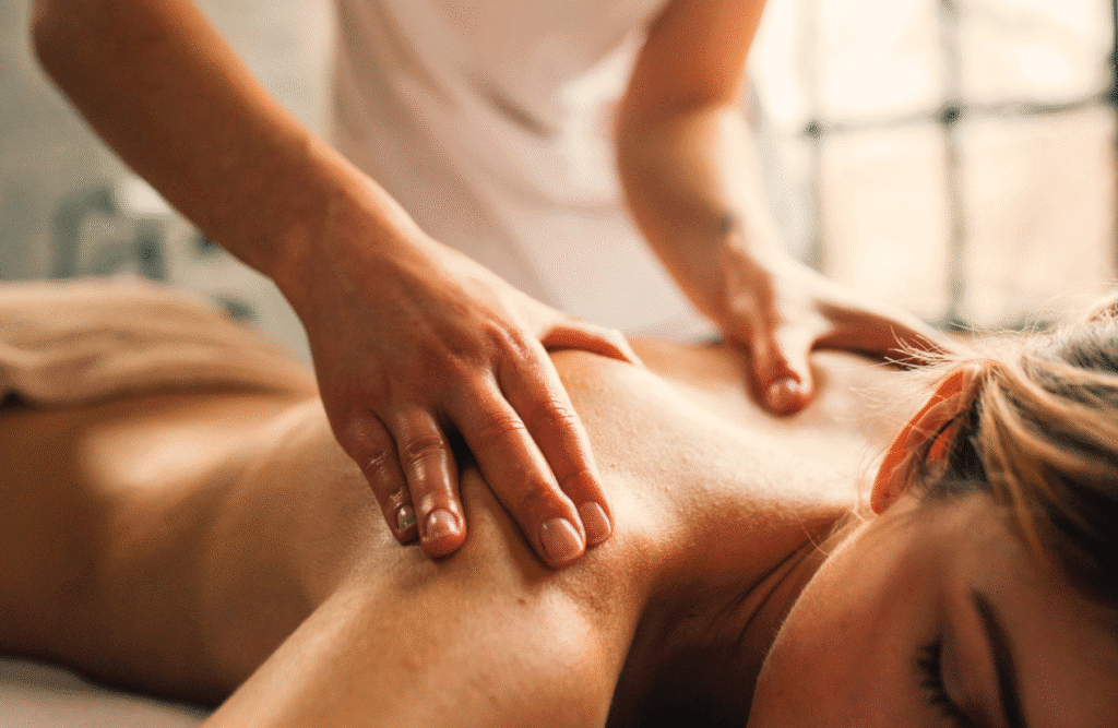 Woman enjoying a therapeutic back massage. Postnatal Massage Brisbane. Massage Northgate. What is Myofascial Release Therapy? Healing Power of Bowen Massage Therapy. Brisbane Livewell Clinic