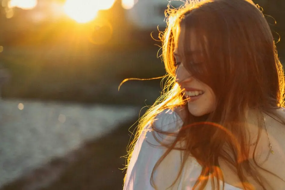 Portrait of a woman smiling under the sun. Hypnotherapy near Chermside. At Home Hormone Test. PCOS. Brisbane Livewell Clinic