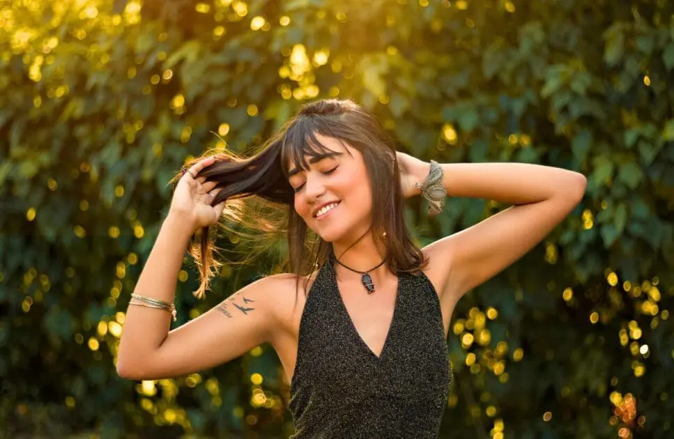 Woman smiling with her eyes closed. Genetic Methylation Testing Australia. Osteopath Carina. Emotionally Overwhelmed Holistic Counselling. Osteopathy and Pelvic Floor Support. Brisbane Livewell Clinic