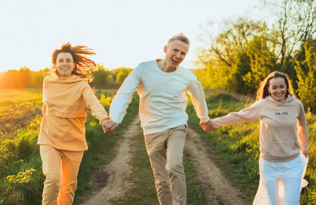 Friends running along a dirt road. Counselling Wooloowin. Holistic Counselling for Adults Who Feel Too Much. Brisbane Livewell Clinic