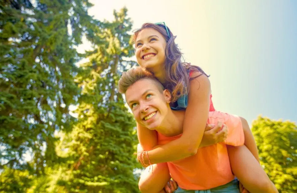 Couple having fun in the park. Couples Counselling Brisbane. Naturopath Anxiety. Brisbane Livewell Clinic