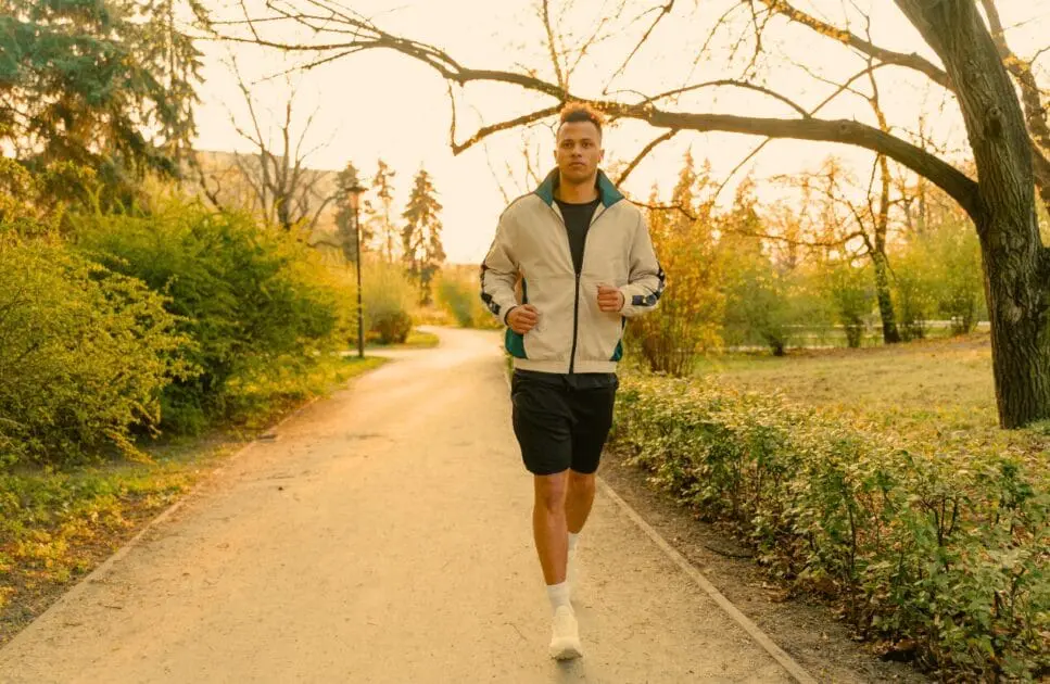 Man jogging at a park. Genetic Methylation Testing Australia. What does an Osteopath do. Brisbane Livewell Clinic