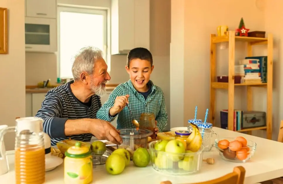 Grandfather and grandson preparing healthy meal. Treating Depression with Naturopathy. What is Leaky Gut Australia. Clinical Nutritionist Seven Hills. Brisbane Livewell Clinic