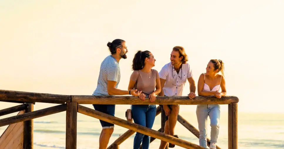 Friends standing on a wooden jetty after Counselling Brisbane. Probiotics for Thrush. Holistic Counselling Brisbane. Osteopath Balmoral. Brisbane Livewell Clinic