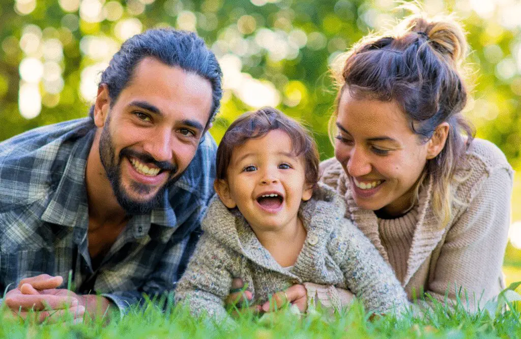 Family having fun in a park. Gut Health Naturopath. Heavy Metal Detox Naturopath. Brisbane Livewell Clinic