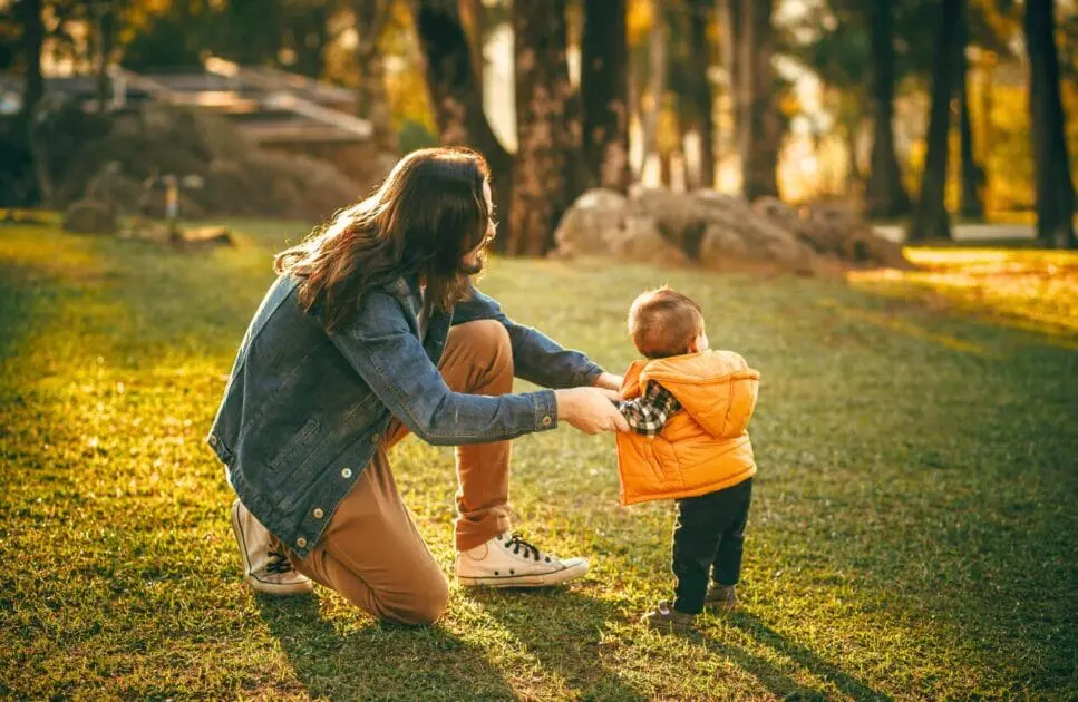 Father and son looking playing together at the park. Hypnotherapy near Clayfield. Postpartum. Brisbane Livewell Clinic