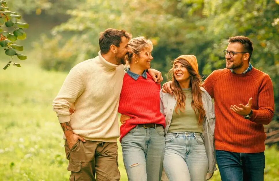 Friends talking and walking around the park. Hypnotherapy near Clayfield. Naturopath vs Homeopath. Weight Loss Hypnotherapy Near Me. Hypnotherapy Weight Loss Near Me. Brisbane Livewell Clinic