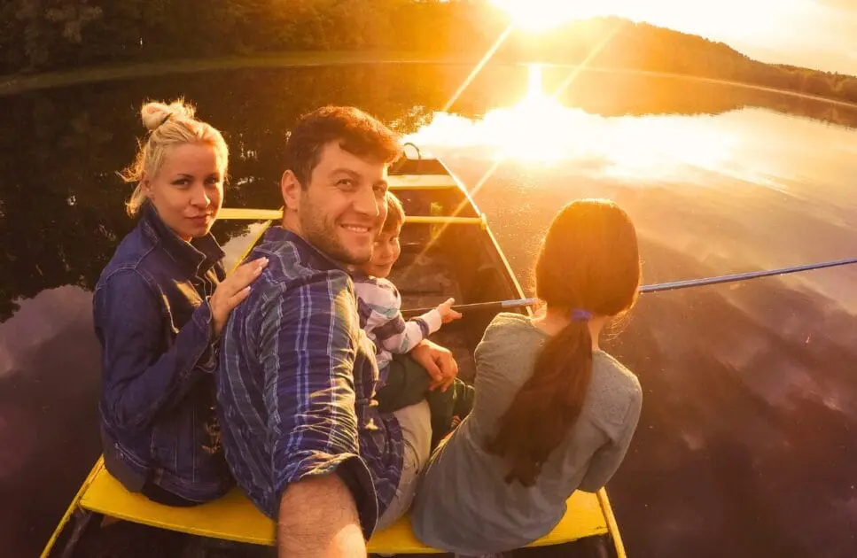 Family smiles as they take a selfie on a boat. Hypnotherapy near Clayfield. Brisbane Livewell Clinic. Hypnotherapy Services Brisbane