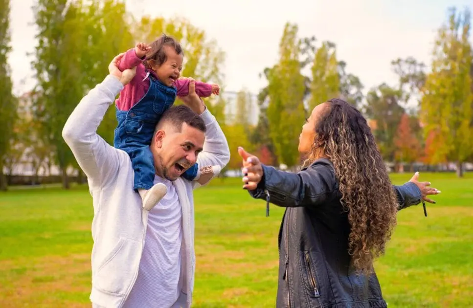 Family spending time together in the park. Hypnotherapy near Stafford. Bridgeman Downs. Naturopathic Practitioner. Osteopath for Frozen Shoulder. Brisbane Livewell Clinic