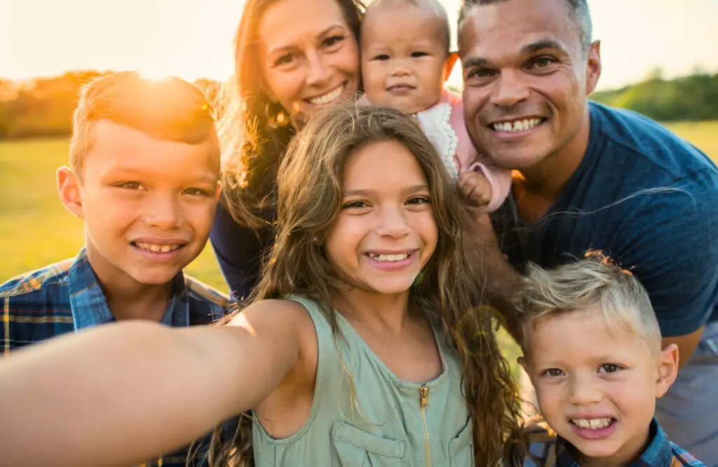 Family outdoors taking a group selfie. Naturopath Sunshine Coast. Naturopath Wavell Heights. Heavy Metal Detox Naturopath. Brisbane Livewell Clinic