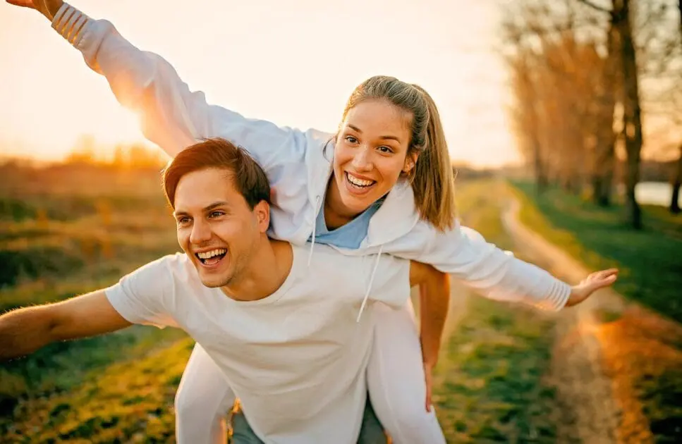 Man and woman enjoying outdoors together. Naturopathic Practitioner. Is Osteopathy the same as Physiotherapy. Quit Smoking Hypnotherapy. Brisbane Livewell Clinic