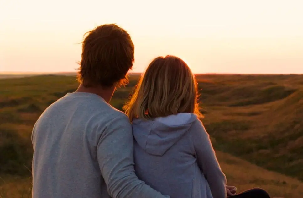 Couple sitting on the grass, looking at nature. Counselling Carina. I Feel Too Much Too Deeply. Counselling Morningside. Brisbane Livewell Clinic