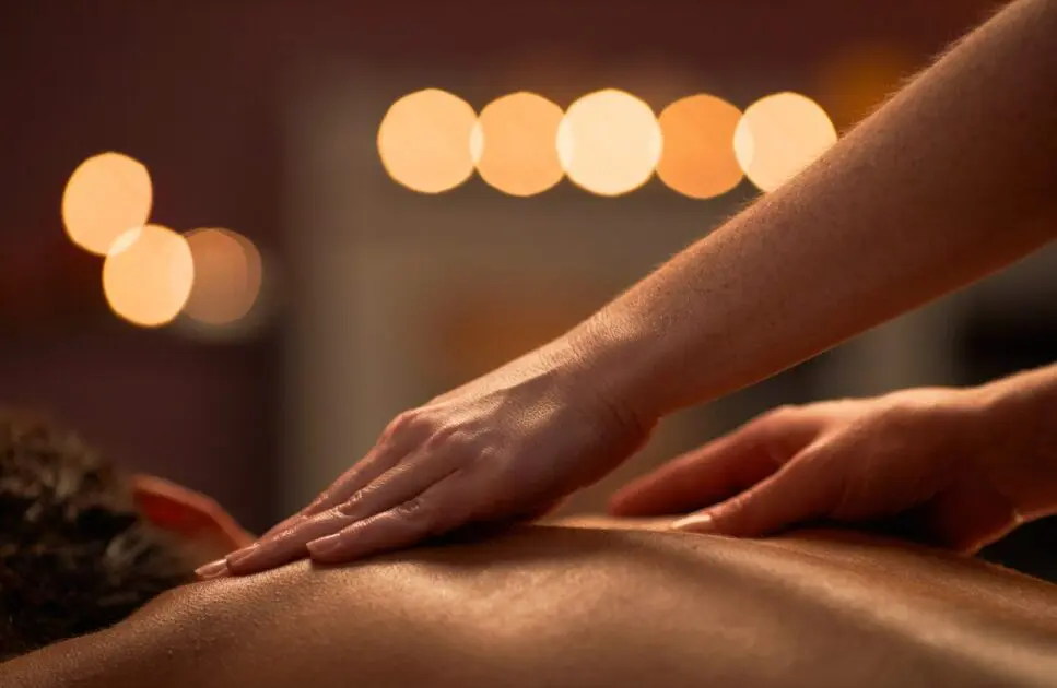 Masseur applying gentle pressure to the client's back. Myofascial Release Therapy Massage Near Me. How to Choose a Massage Therapist. Brisbane Livewell Clinic